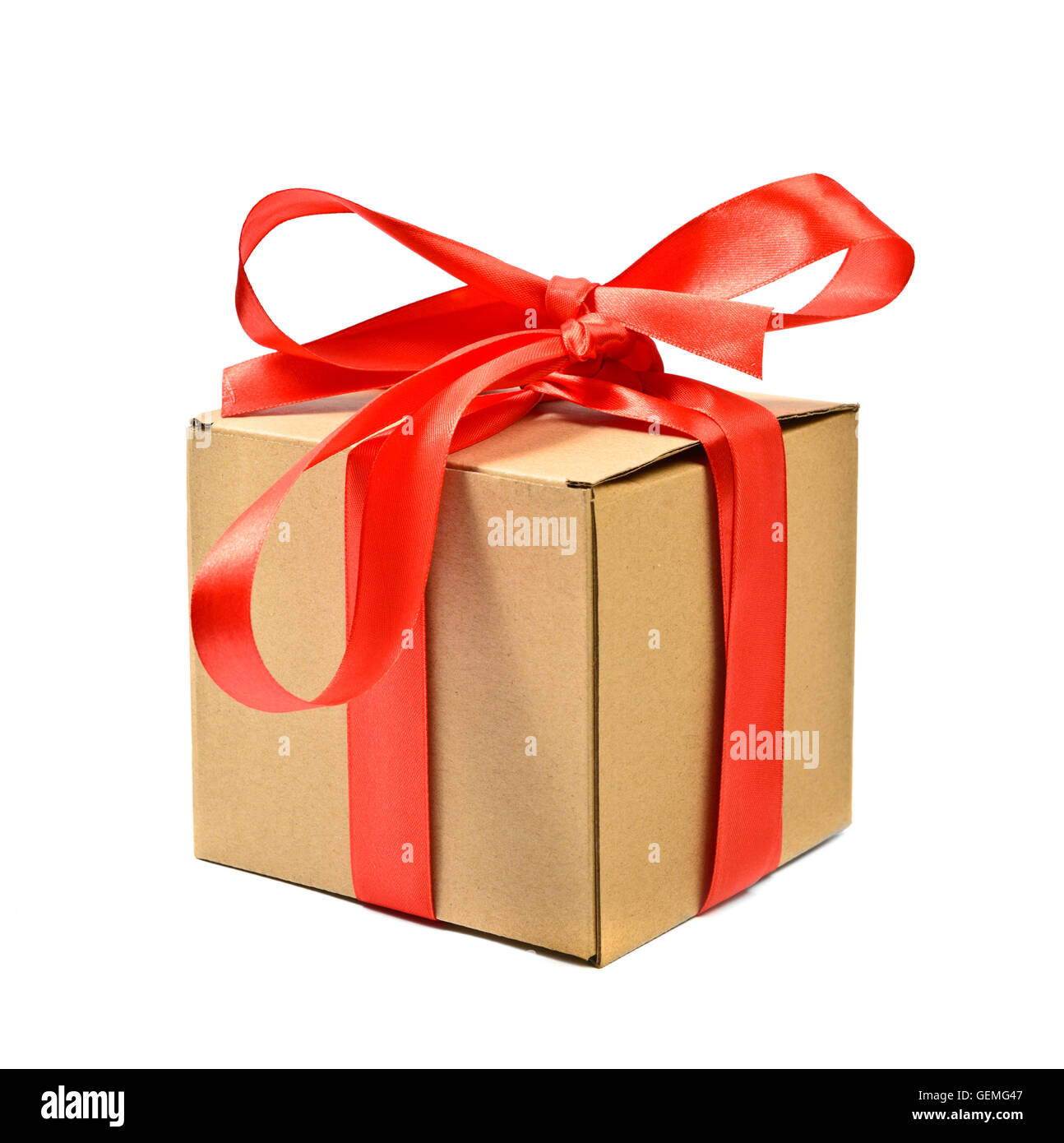 Cardboard gift box with red ribbon bow, isolated on white Stock Photo