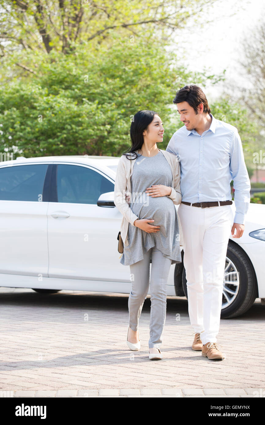 Happy pregnant Chinese woman and her husband Stock Photo