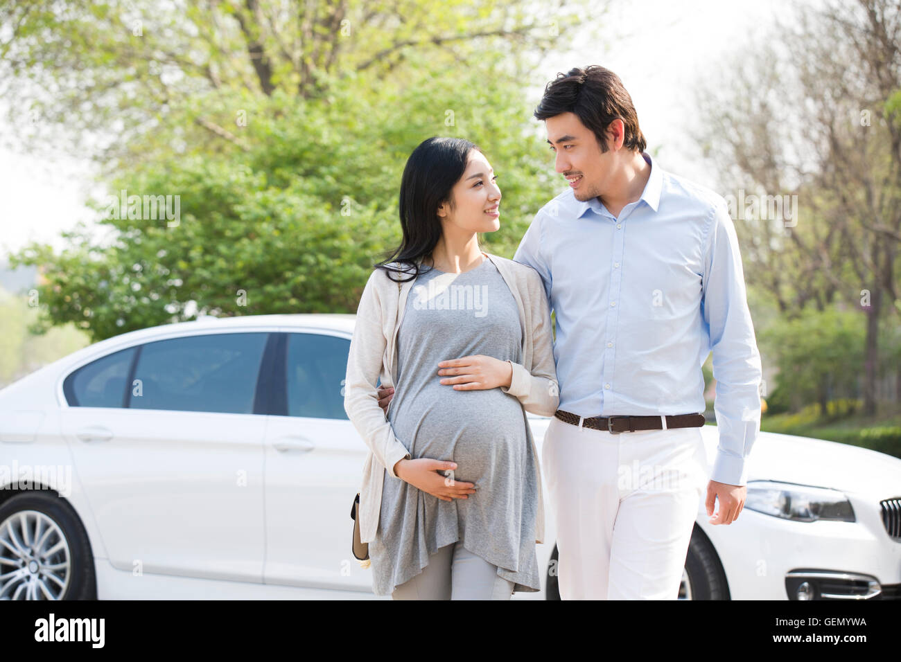 Happy pregnant Chinese woman and her husband Stock Photo Alamy