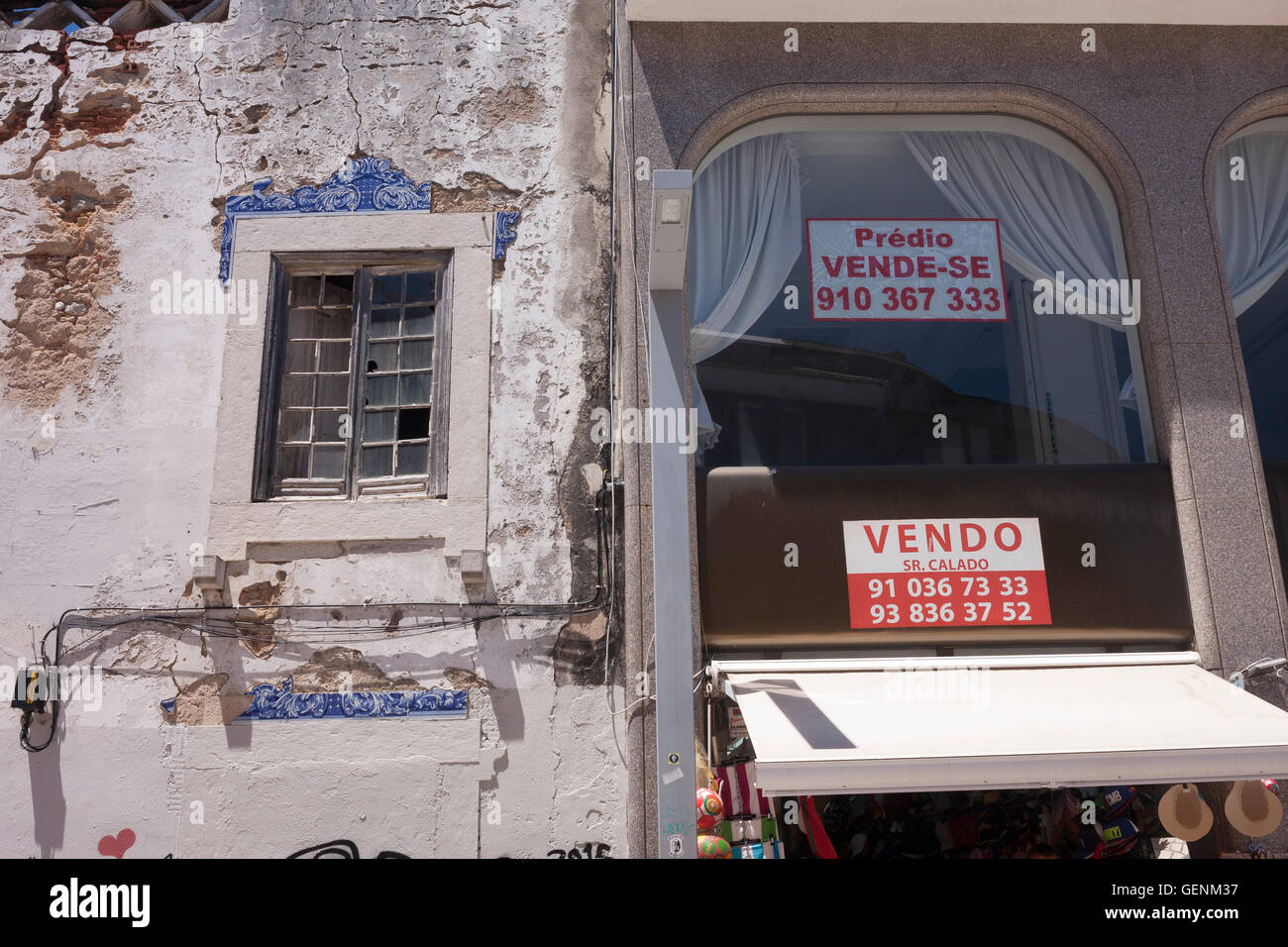 Newly restored property for sale next door to a crumbling, abandoned