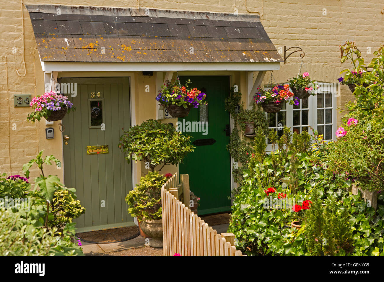 UK, England, Devon, Sidmouth, York Street, cottage doors and small front gardens Stock Photo