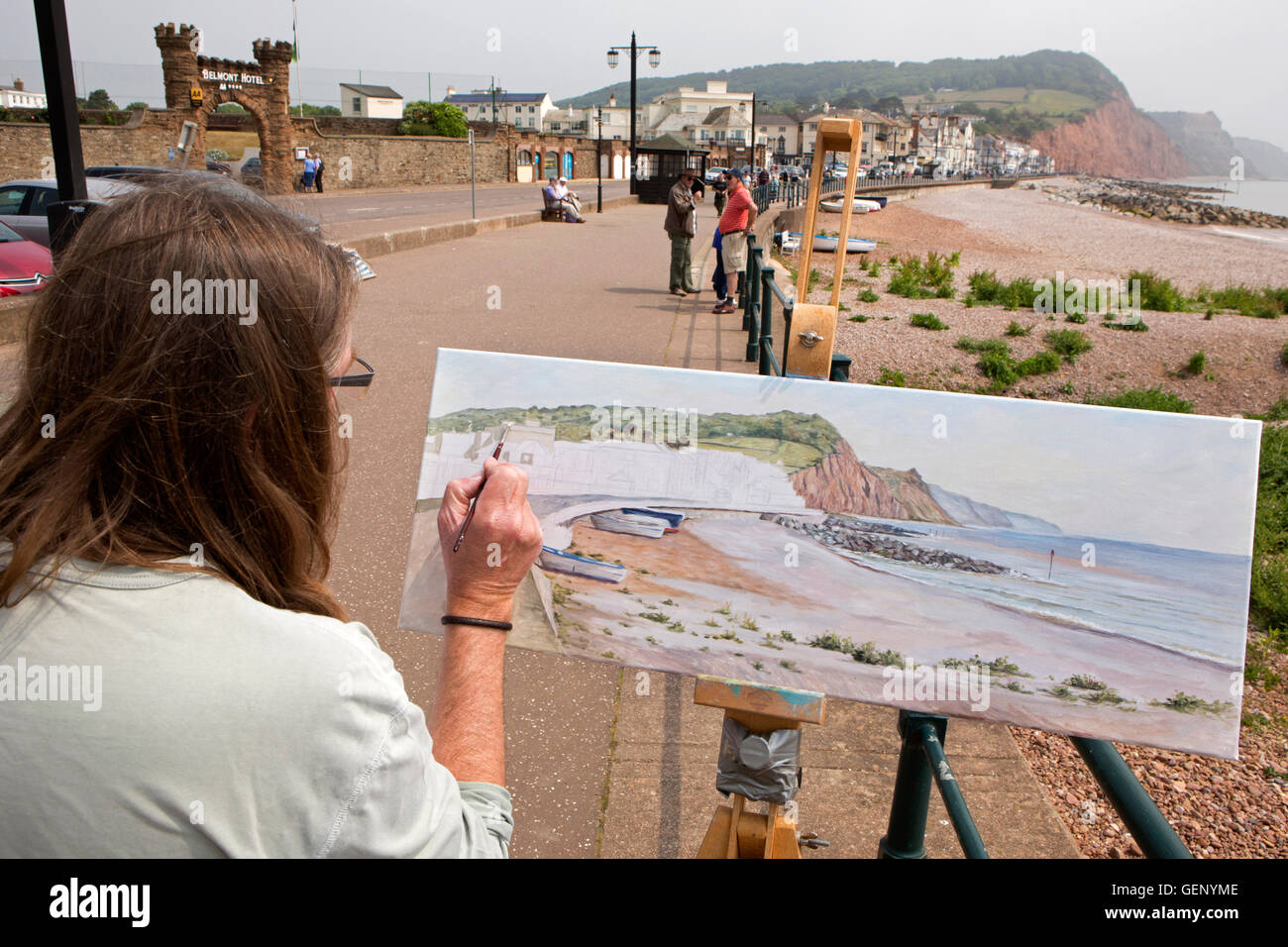 UK, England, Devon, Sidmouth, artist painting the Esplanade in sunshine Stock Photo