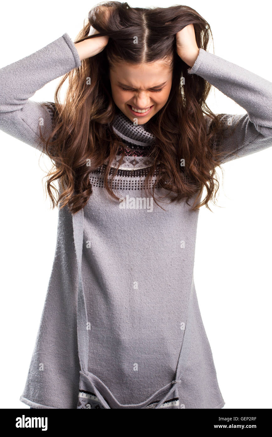 Woman is pulling hair. Stock Photo