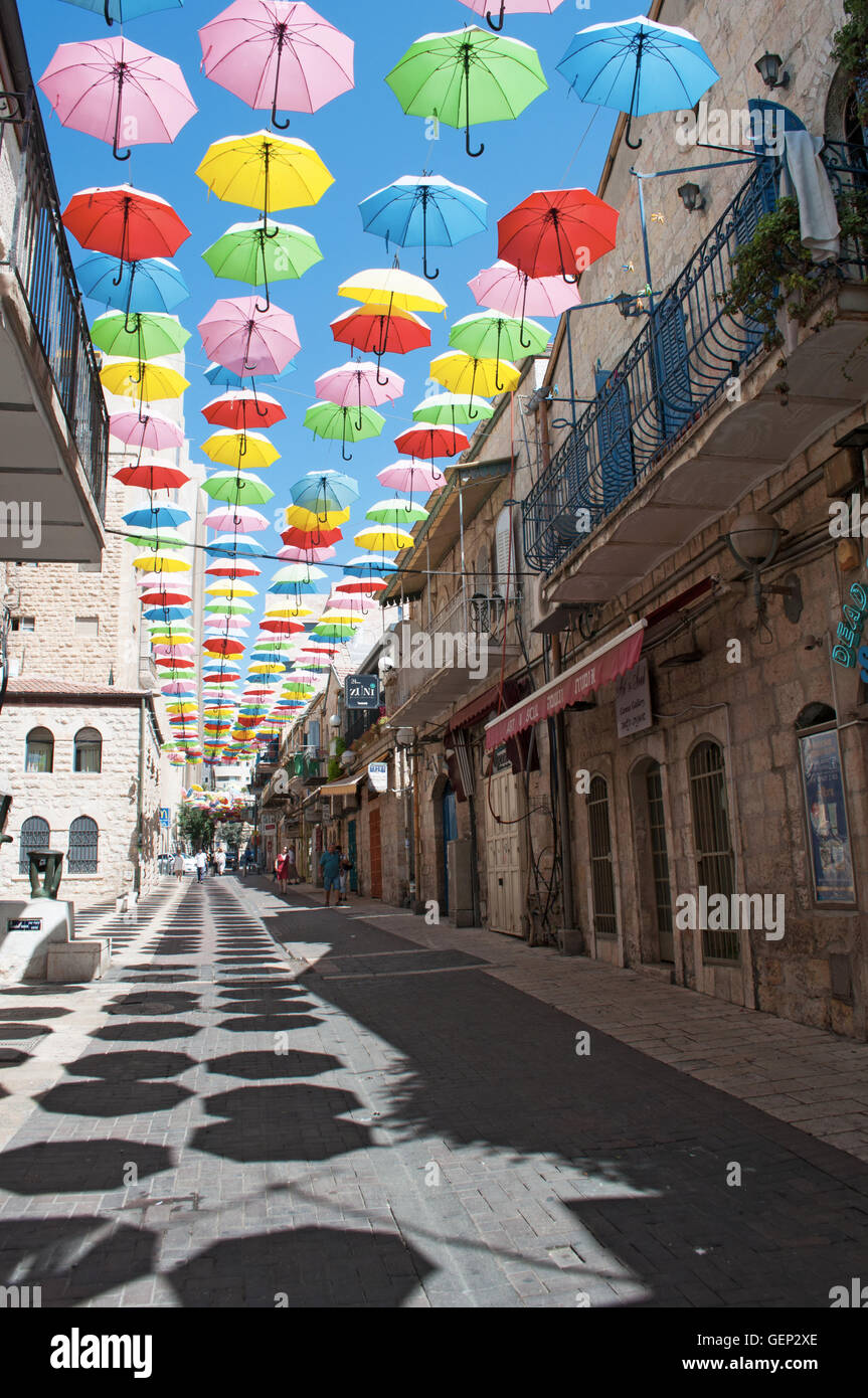 Jerusalem: colorful umbrellas hanging on Yoel Moshe Solomon Street for the Umbrellas Street Project promoted by Jerusalem Development Authority Stock Photo
