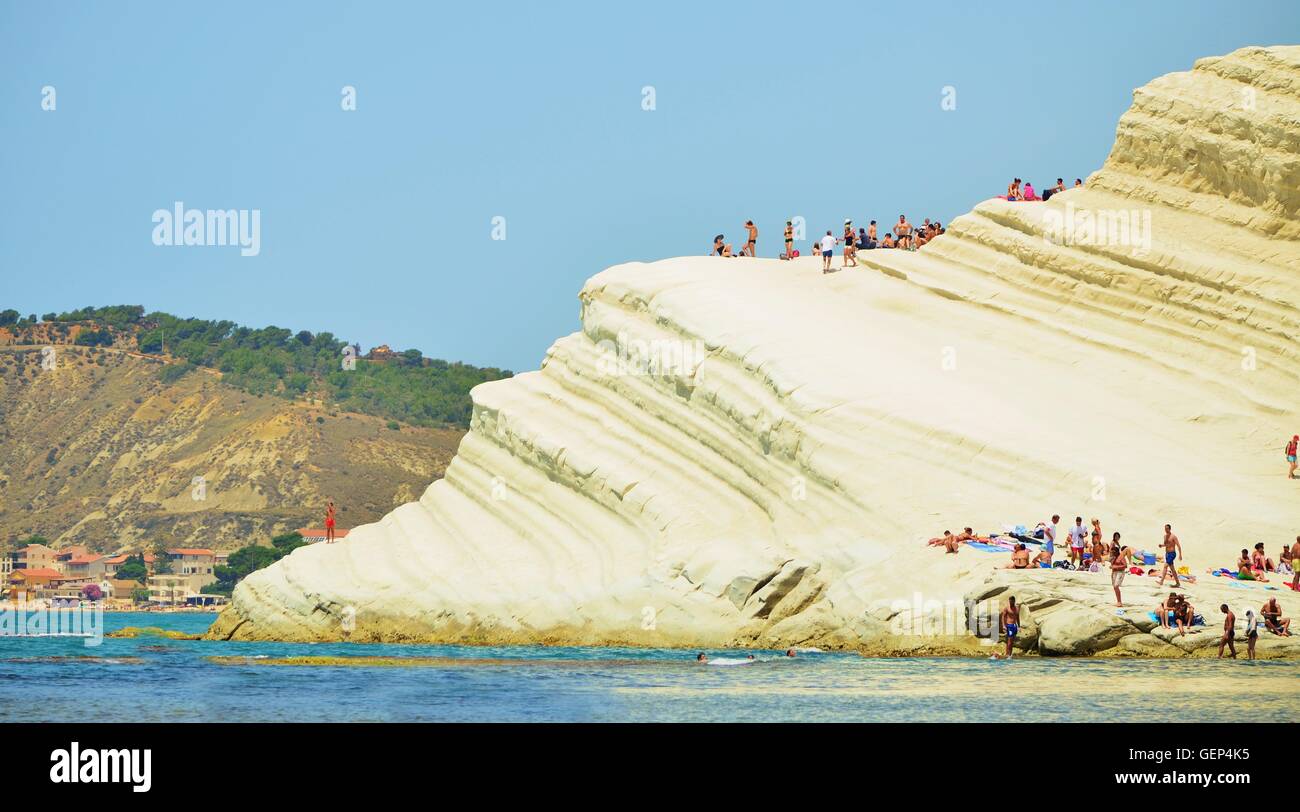 Scala dei Turchi is a popular tourist destination in the south of Sicily famous for its white stair-shaped cliffs Stock Photo