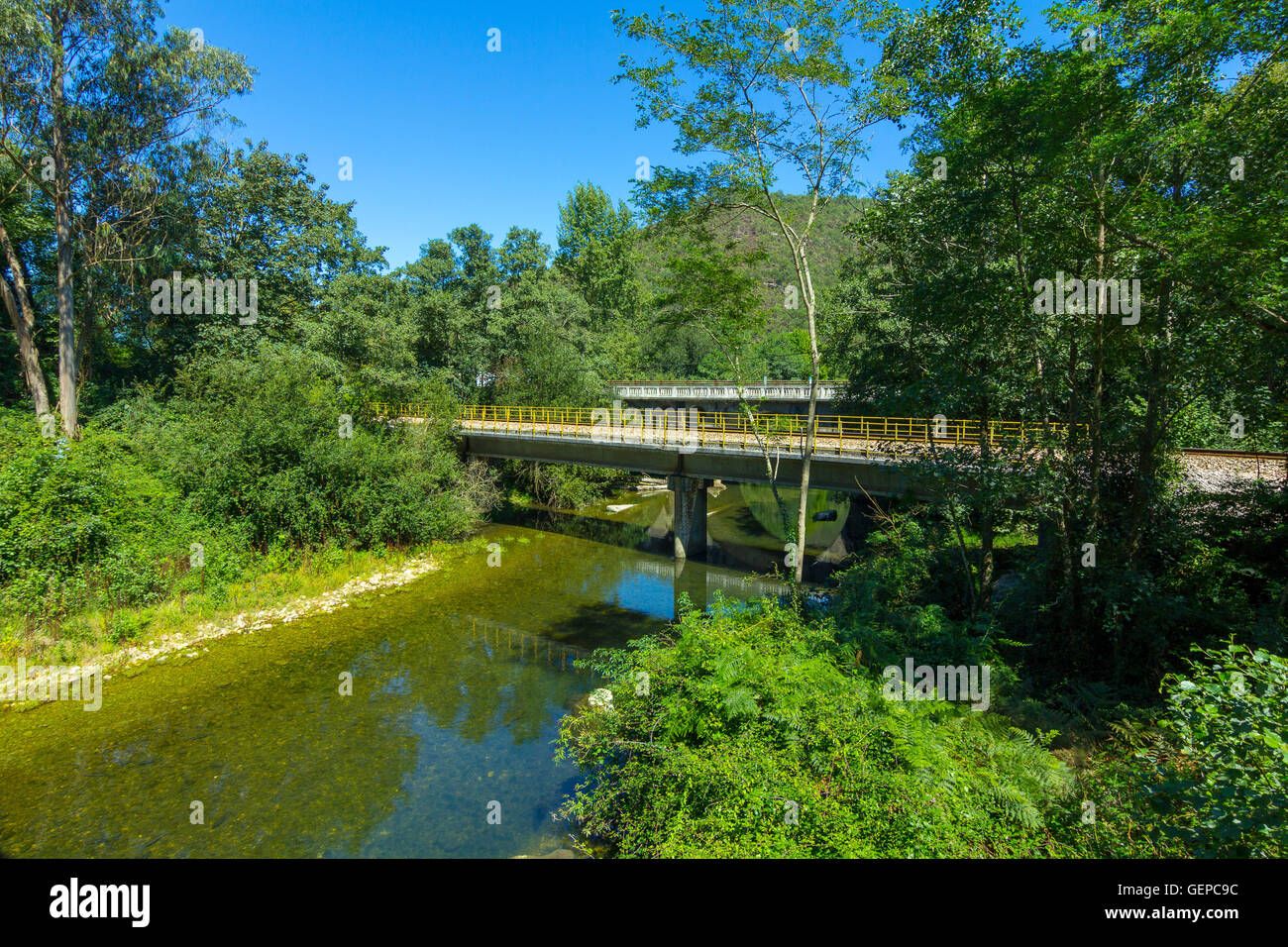 Small railway bridge over a river Stock Photo