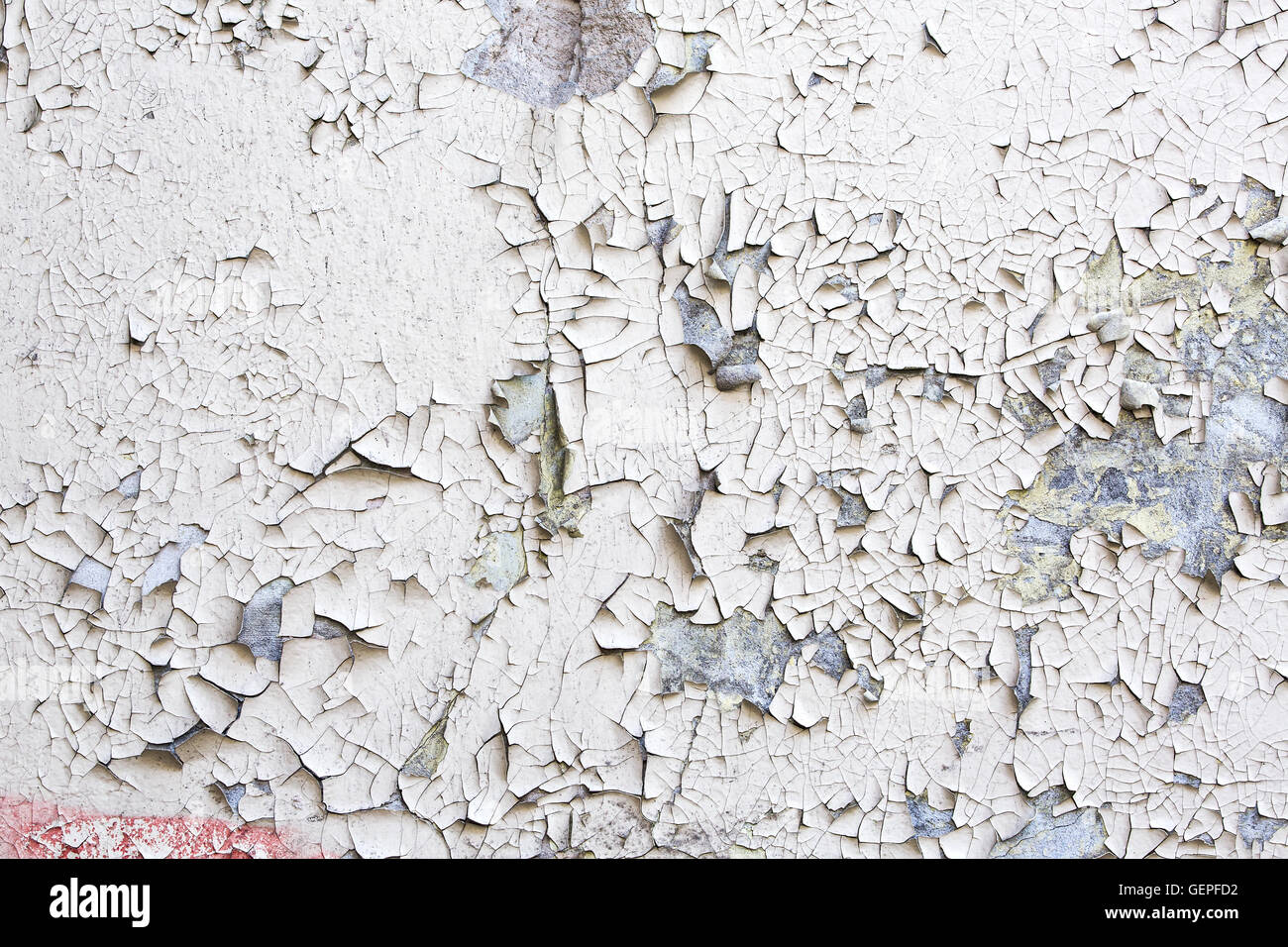 old white peeled paint on plaster wall background Stock Photo