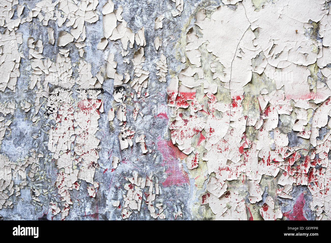old white peeled paint remain on plaster wall background Stock Photo