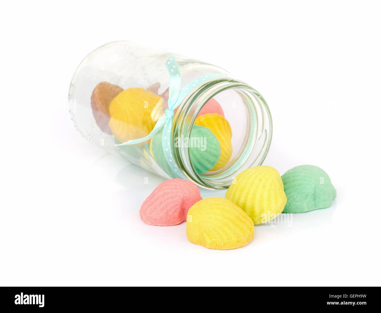 shell cookies with a bottle on white background Stock Photo - Alamy