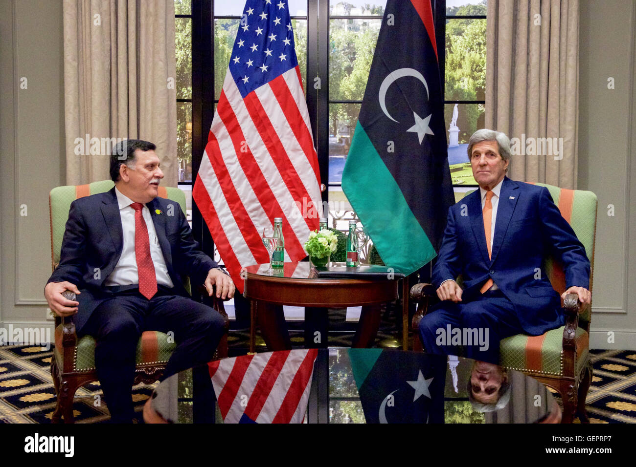 Secretary John Kerry Sits With Libyan Prime Minister al-Sarraj at the Bristol Hotel in Vienna Stock Photo