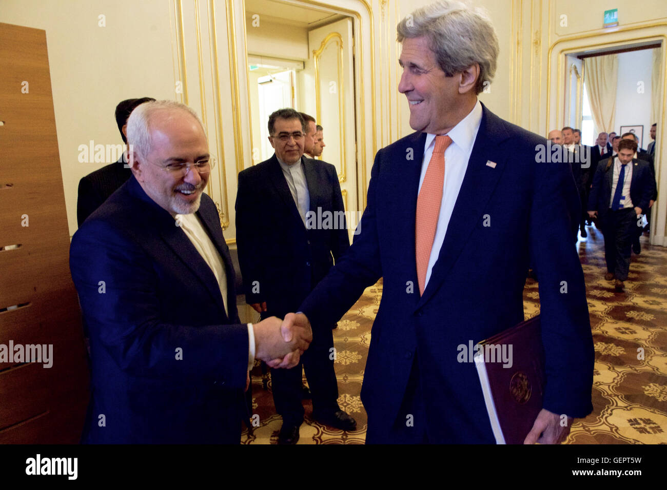 Secretary Kerry and Iranian Foreign Minister Zarif Share a Laugh Before Their Meeting in Vienna Stock Photo