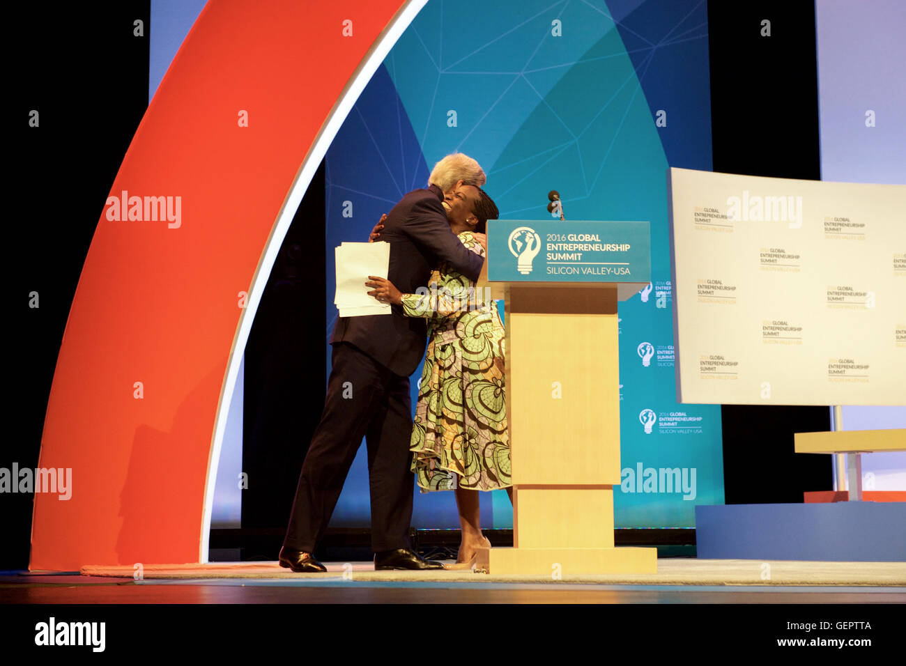 Secretary Kerry Hugs YALI Alum Patricia Nzolantima Before Addressing the Opening Plenary of the 2016 Global Entrepreneurship Summit in Palo Alto Stock Photo