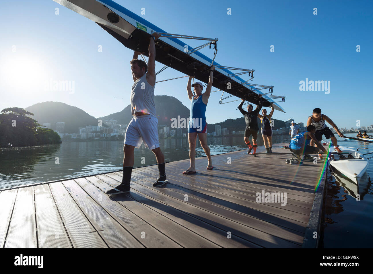 RIO DE JANEIRO - MARCH 22, 2016: After training, Brazilian rowers carry ...