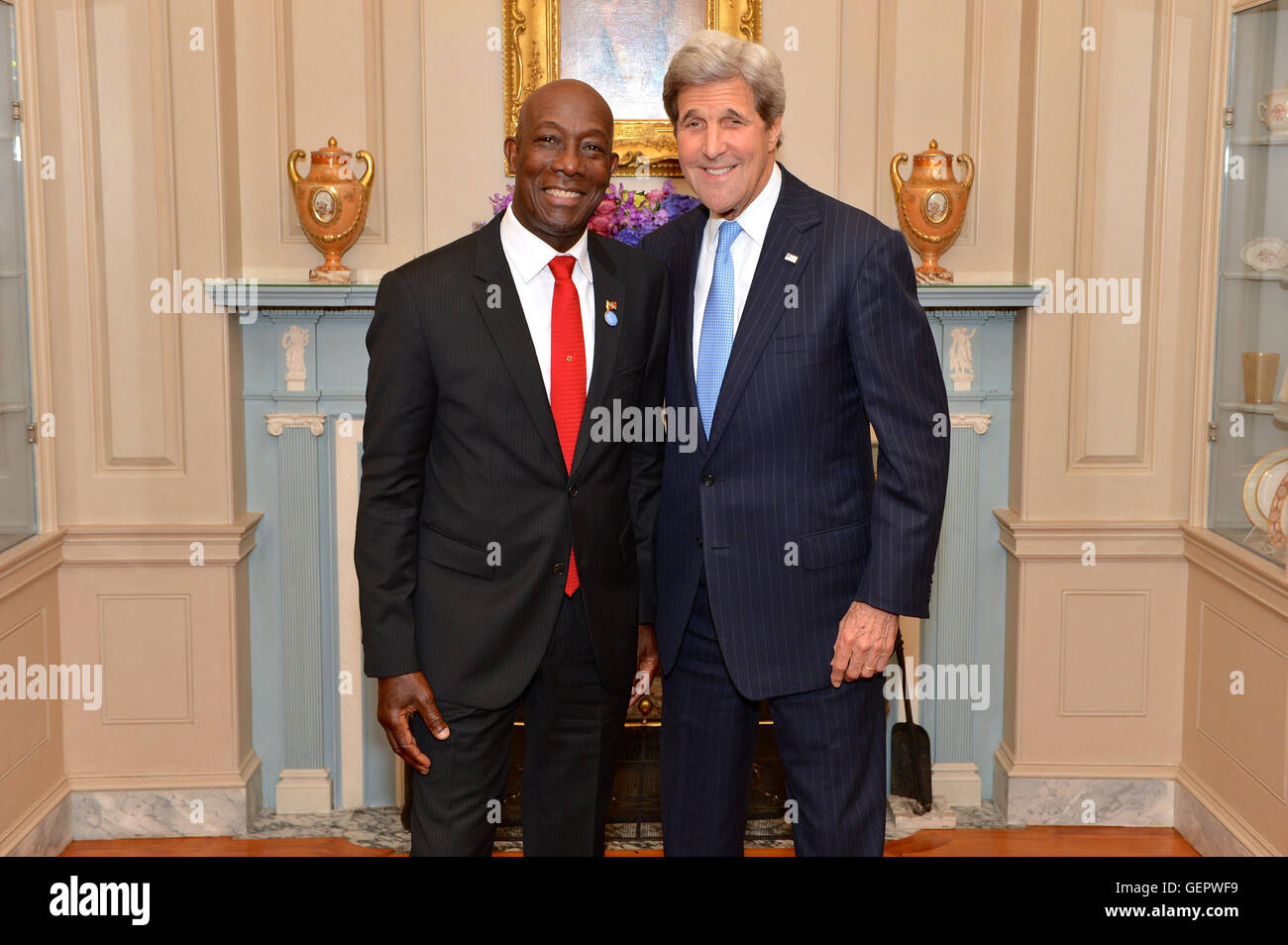 Secretary Kerry Poses for a Photo With President Rowley of Trinidad and Tobago Before Addressing a Joint Reception in Honor of the 46th Annual Washington Conference on the Americas and the U.S.-Caribbean-Central American Energy Summit Stock Photo