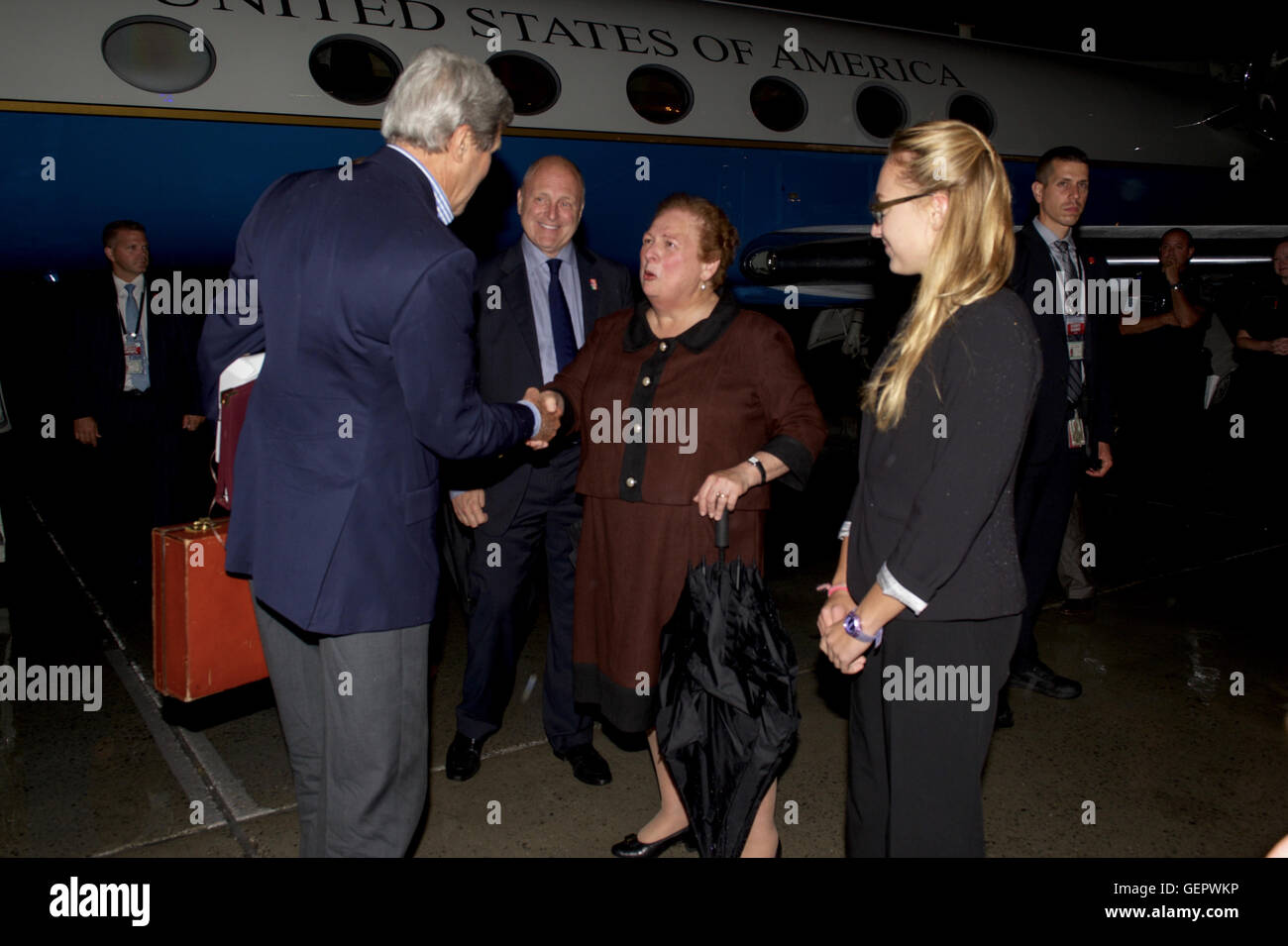 Secretary Kerry Shakes Hands with Acting Assistant Secretary for Western Hemisphere Affairs Mari Carmen Aponte After Landing in Ottawa, Canada Stock Photo