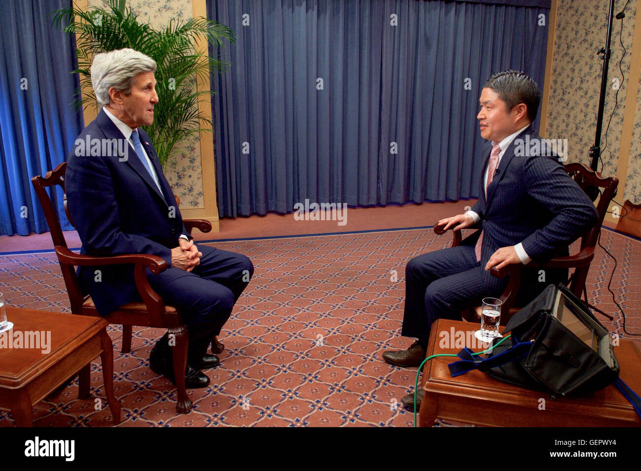 Secretary Kerry Sits With Correspondent Morio Chijiiwa of TV Asahi Before an Interview in Hiroshima Stock Photo