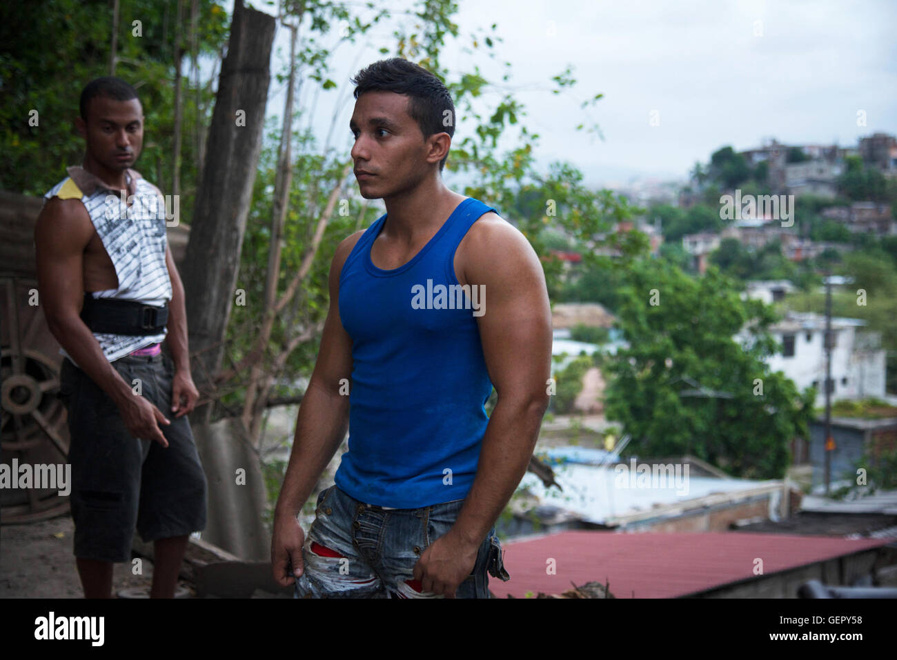 Young men in an outdoors gym - Santiago - Cuba Stock Photo