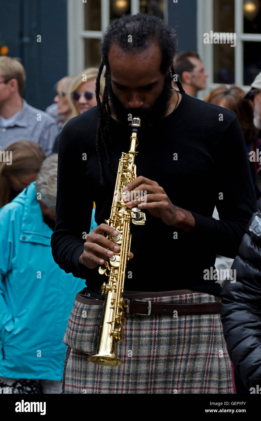 The soprano sax player with the New Orleans Swamp Donkeys playing at the Mardi Gras, part of the Edinburgh Jazz Festival. Stock Photo
