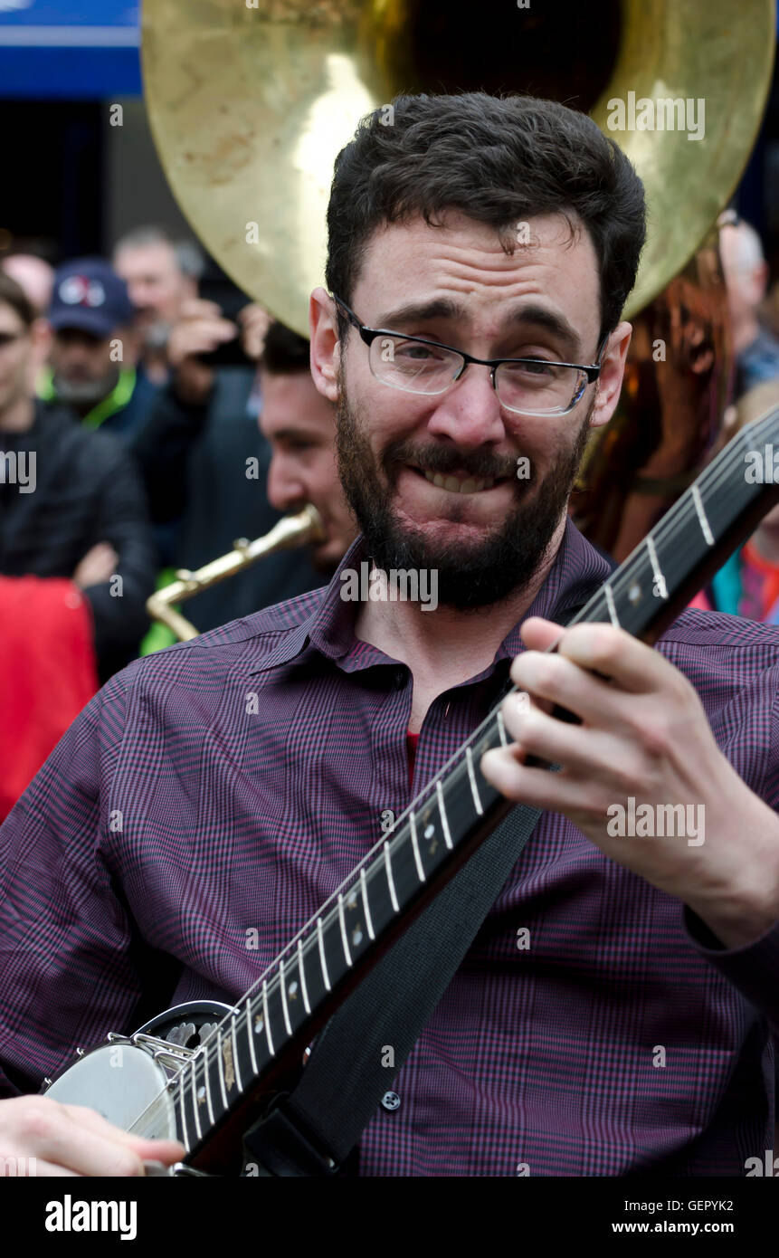 Sam Friend, the banjo player with the New Orleans Swamp Donkeys playing at the Mardi Gras, part of the Edinburgh Jazz Festival. Stock Photo