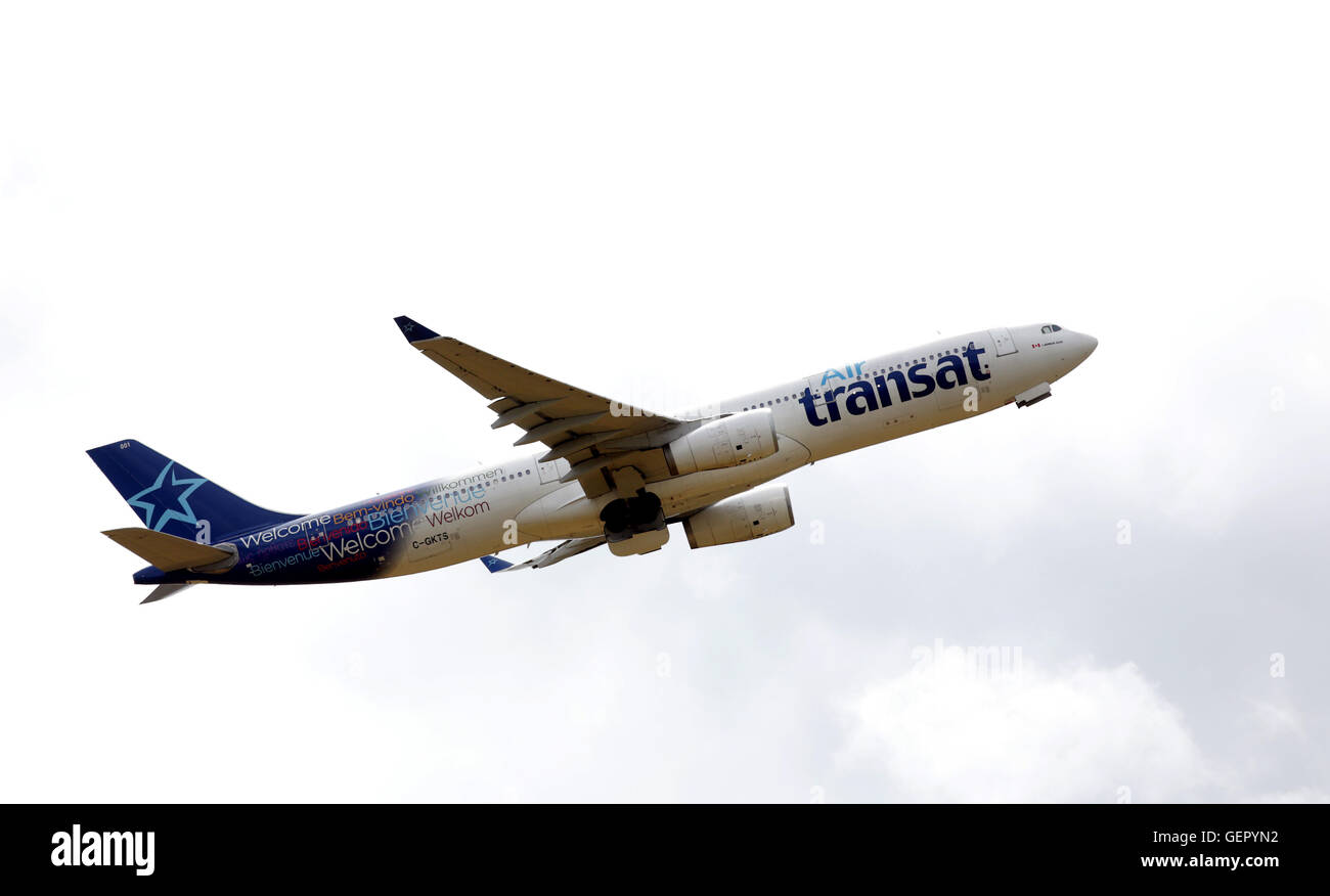 An Air transat Airbus A330 registration C-GKTS, takes off from Gatwick Airport in Crawley, West Sussex. Stock Photo
