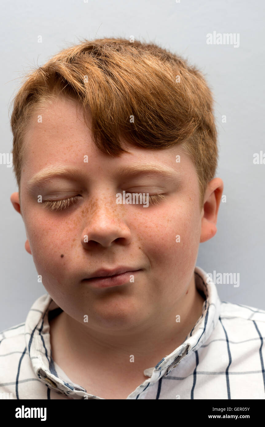 Boy with ginger hair Stock Photo