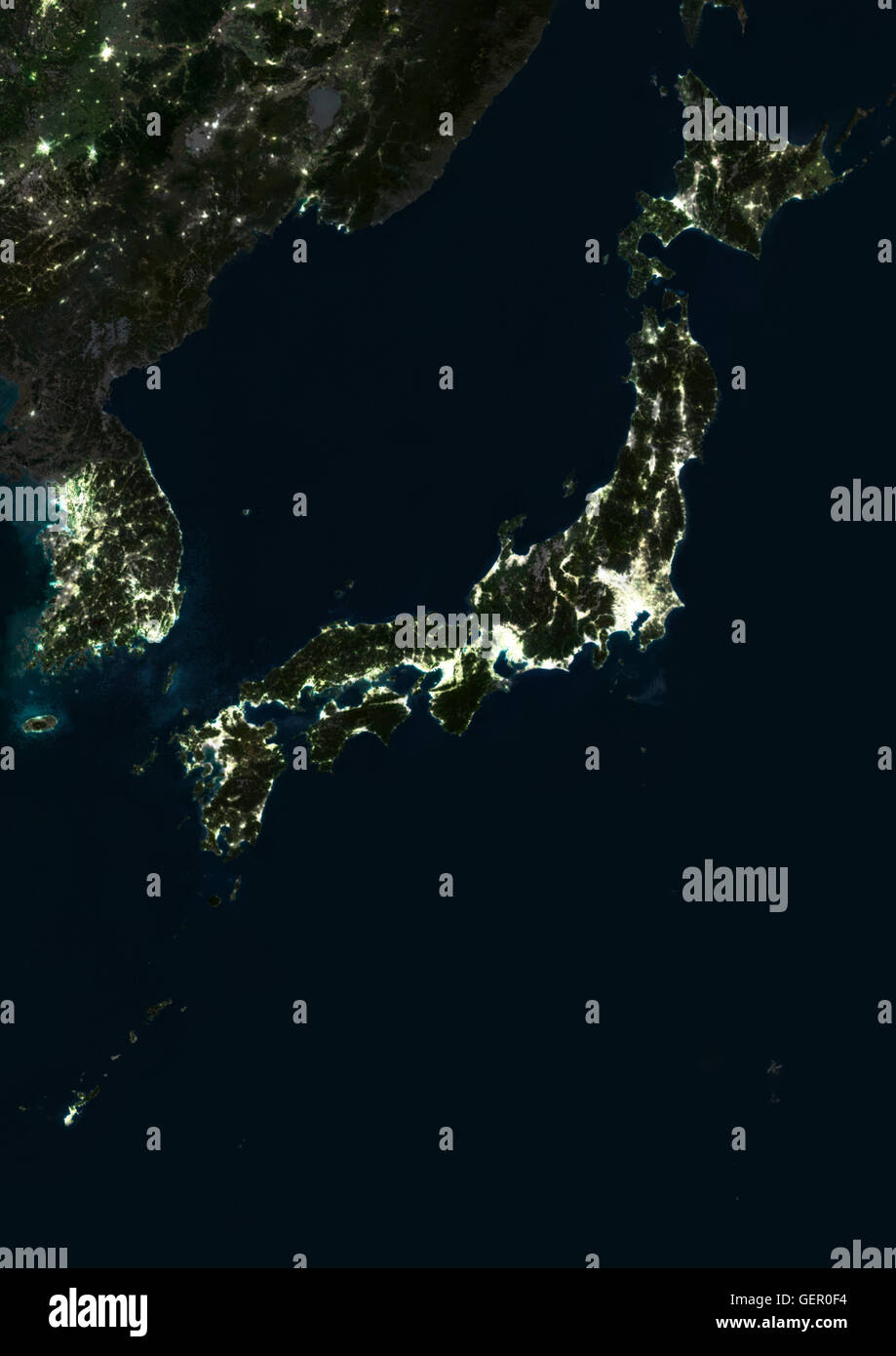 Satellite image of Japan at night. This satellite image shows urban and industrial lights. Stock Photo