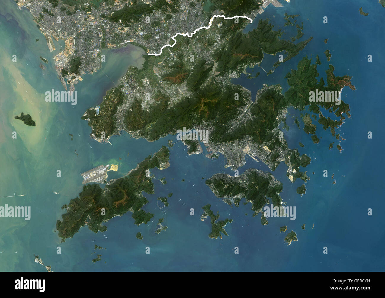 Satellite view of Hong Kong (with country boundaries). This image was compiled from data acquired by Landsat 8 satellite in 2015. Stock Photo