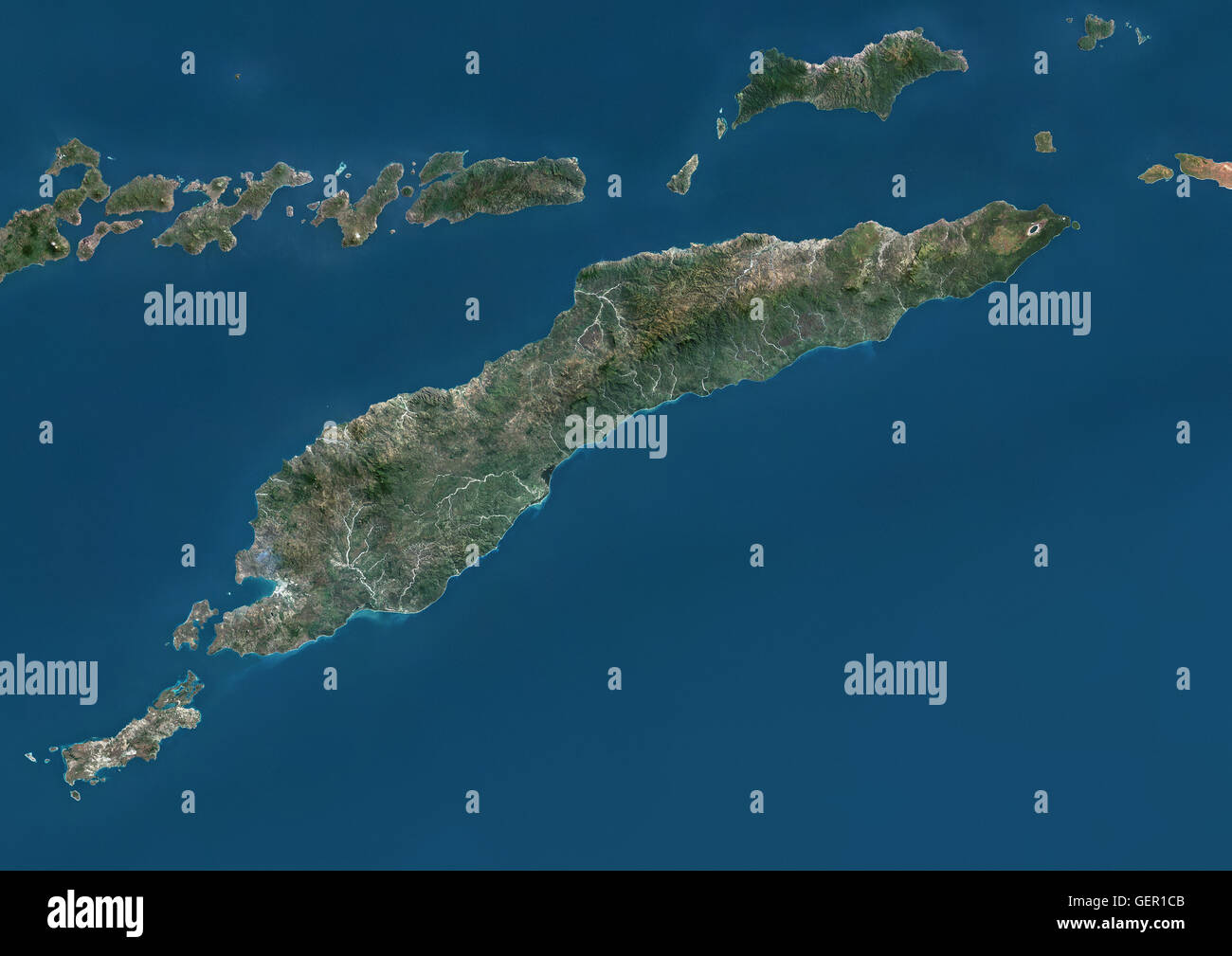 Satellite view of Timor Island, that is divided between East Timor, on the eastern part, and Indonesia, on the western part. This image was compiled from data acquired by Landsat satellites. Stock Photo