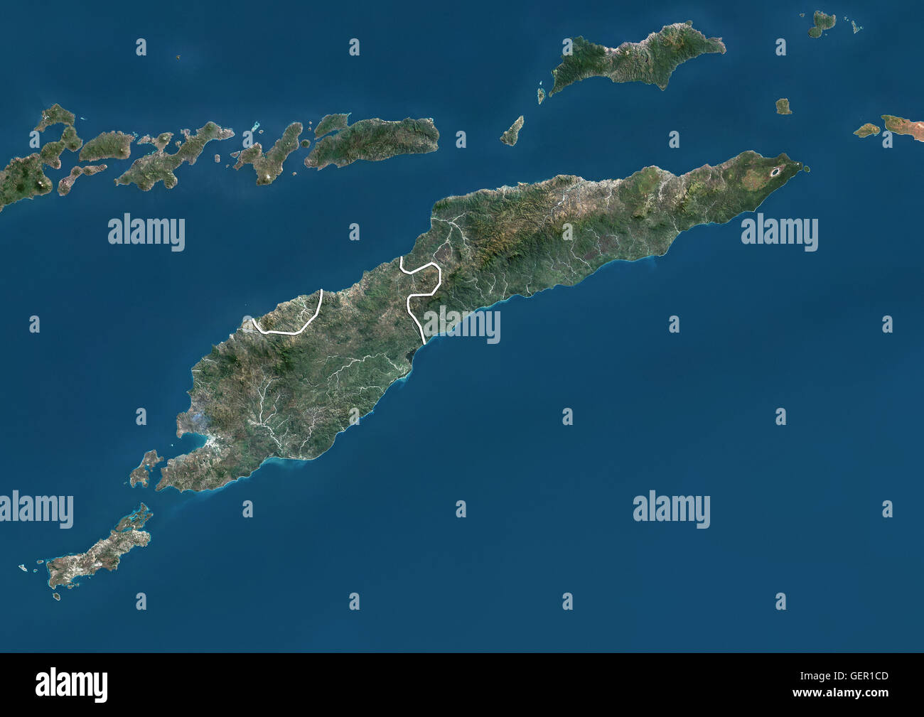 Satellite view of Timor Island, that is divided between East Timor, on the eastern part, and Indonesia, on the western part. This image was compiled from data acquired by Landsat satellites. Stock Photo