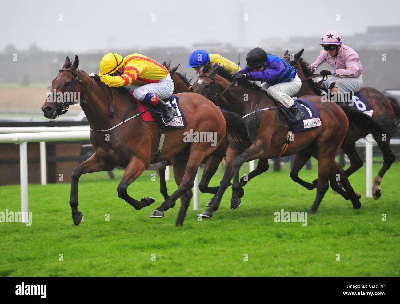 Beau Satchel ridden by Declan McDonogh wins the Caulfield Industrial Handicap during day two of the Galway Festival in Ballybrit, Ireland. Stock Photo