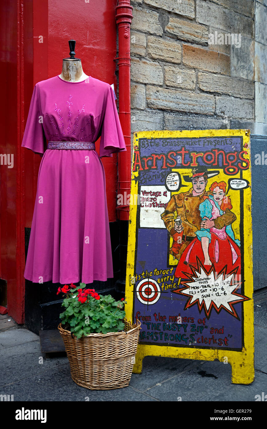 Sign and vintage dress in the doorway of a branch of Armstrong's vintage clothing store in Edinburgh, Scotland, UK. Stock Photo