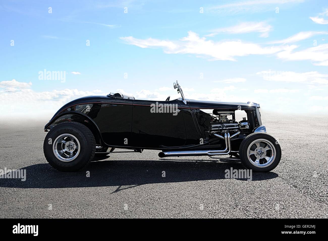 1937 Ford Coupe  Hot Rod standing on an airfield drag strip on a sunny day Stock Photo