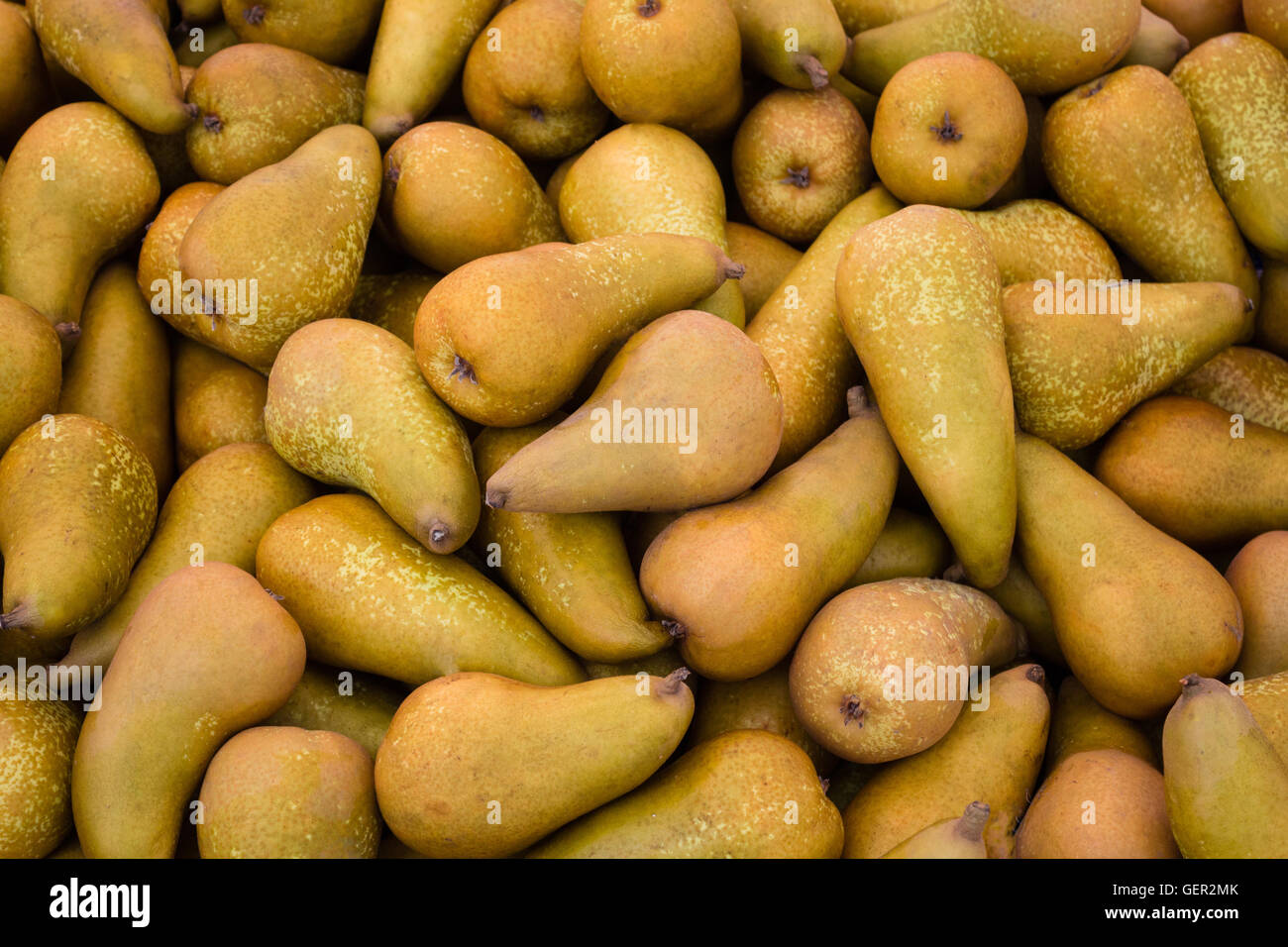 group of pear fruits macro on food market Stock Photo