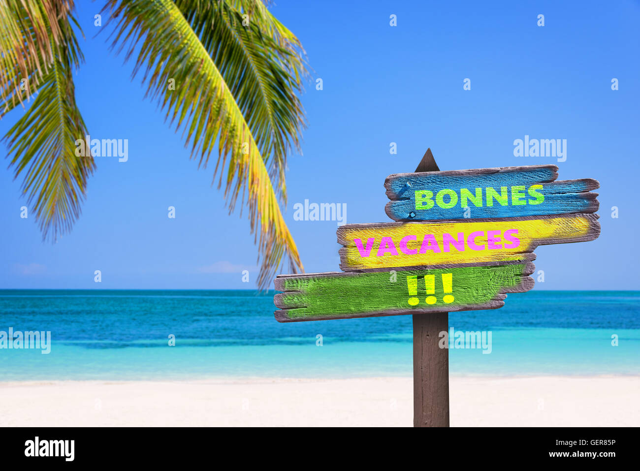 Bonnes vacances (meaning happy summer) on direction signs, beach and