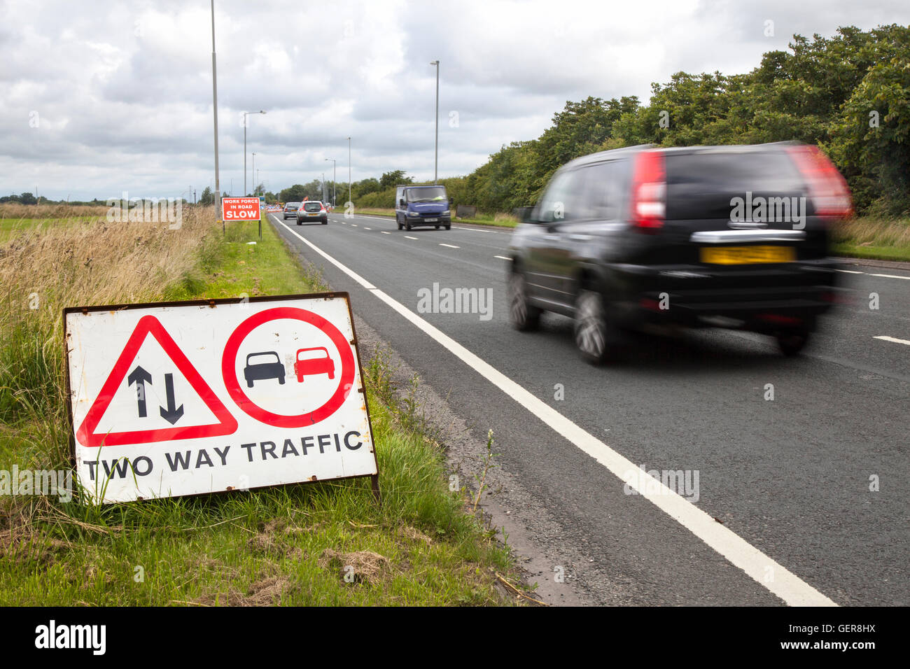 Chapter 8 Traffic Management systems in place on major long-term road works and temporary traffic lights on Preston arterial road, B5253 Flensburg Way in Farington Moss, Lancashire, UK. Stock Photo