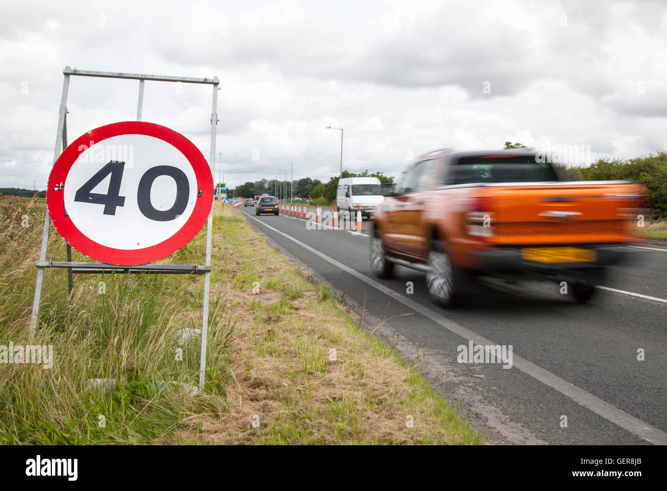 40mph speed restrictions. Chapter 8 Traffic Management systems in place on major long-term road works and temporary traffic lights on Preston arterial road, B5253 Flensburg Way in Farington Moss, Lancashire, UK. Stock Photo