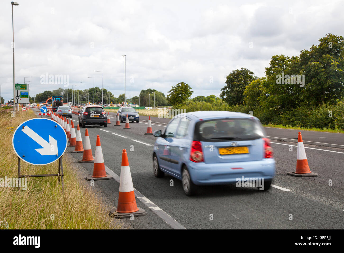 Chapter 8 Traffic Management systems in place on major long-term road works and temporary traffic lights on Preston arterial road, B5253 Flensburg Way in Farington Moss, Lancashire, UK. Stock Photo