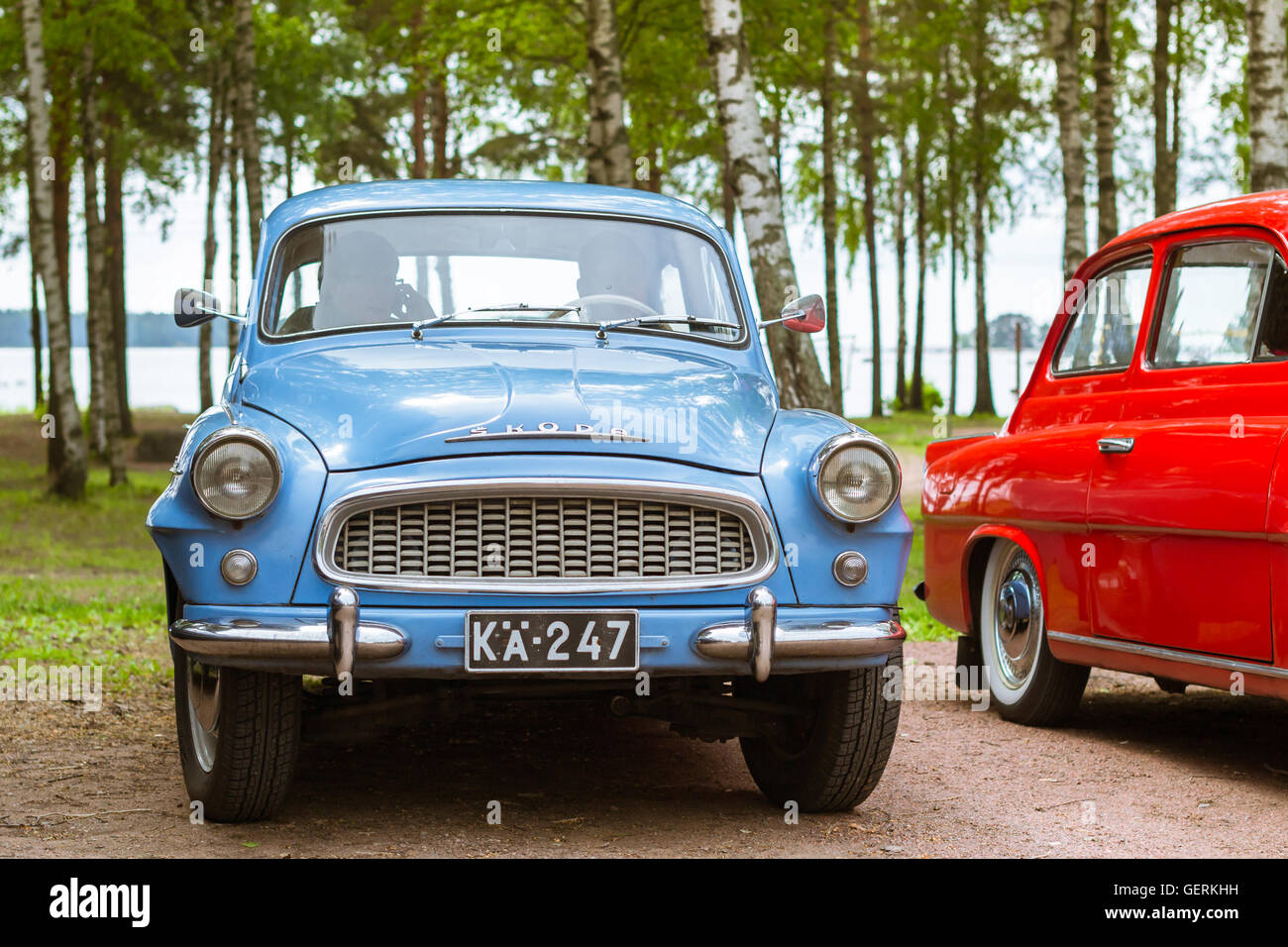 KOTKA, FINLAND - JUNE 14, 2014: blue Skoda Felicia coupe parked on shore of Finnish gulf. Festival and exhibition of retro-club  Stock Photo