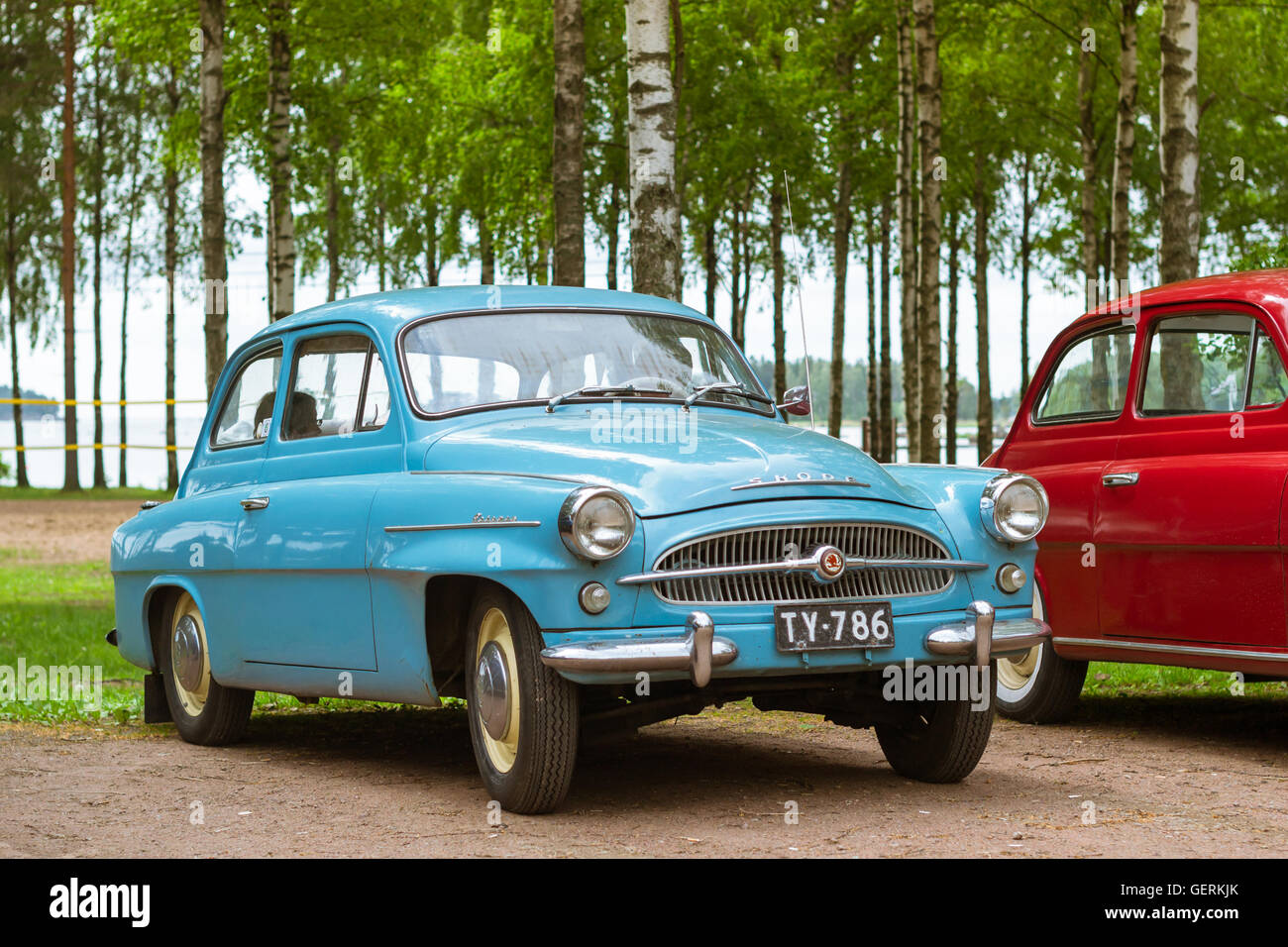 KOTKA, FINLAND - JUNE 14, 2014: Skoda Felicia coupe cars parked on shore of Finnish gulf. Festival and exhibition of retro-club  Stock Photo