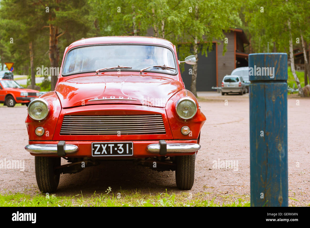 KOTKA, FINLAND - JUNE 14, 2014: Red Skoda Felicia coupe-wagon parked on shore of Finnish gulf. Festival and exhibition Stock Photo