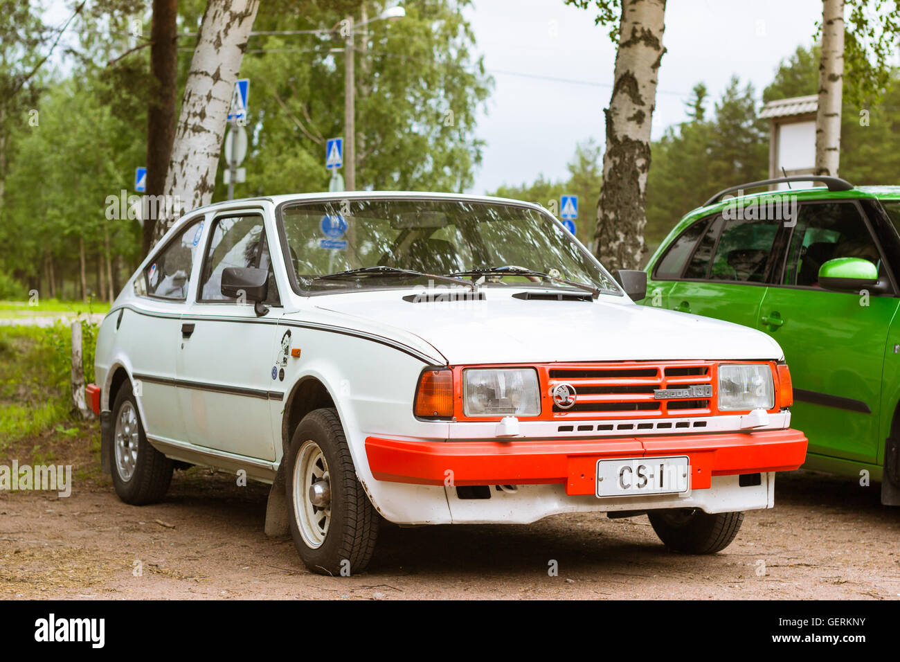 KOTKA, FINLAND - JUNE 14, 2014: Skoda 130 coupe car parked on shore of Finnish gulf. Festival and exhibition of retro-club Stock Photo