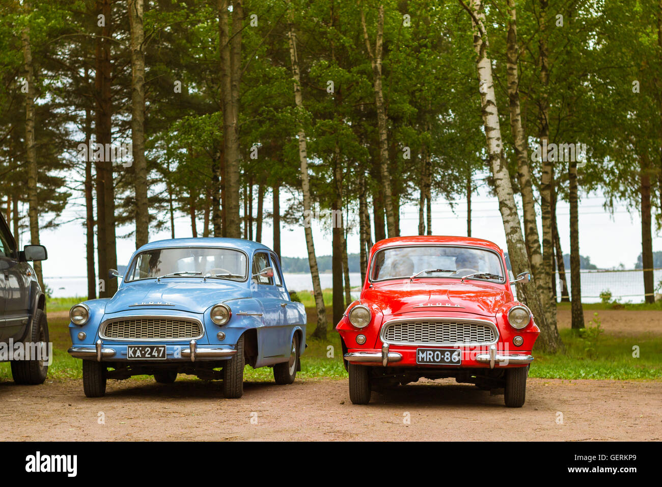 KOTKA, FINLAND - JUNE 14, 2014: Skoda Felicia coupe cars parked on shore of Finnish gulf. Festival and exhibition of retro-club Stock Photo