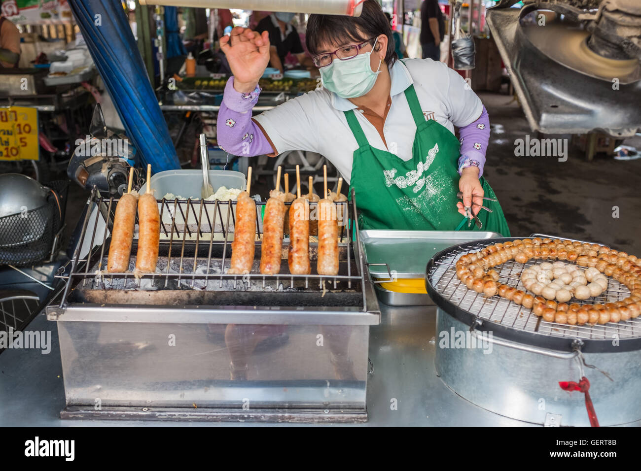Street food trader selling grilled sausage and meat ball,Chiang Mai ...