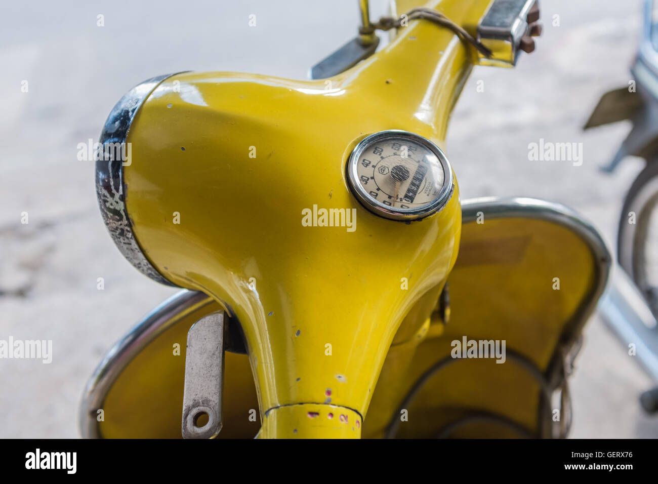 Close up detail yellow vespa,italian scooter,Chiang Mai Thailand Stock Photo