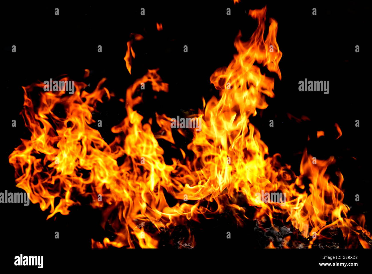 fire burn on dark background patter of frame , high resolution Stock