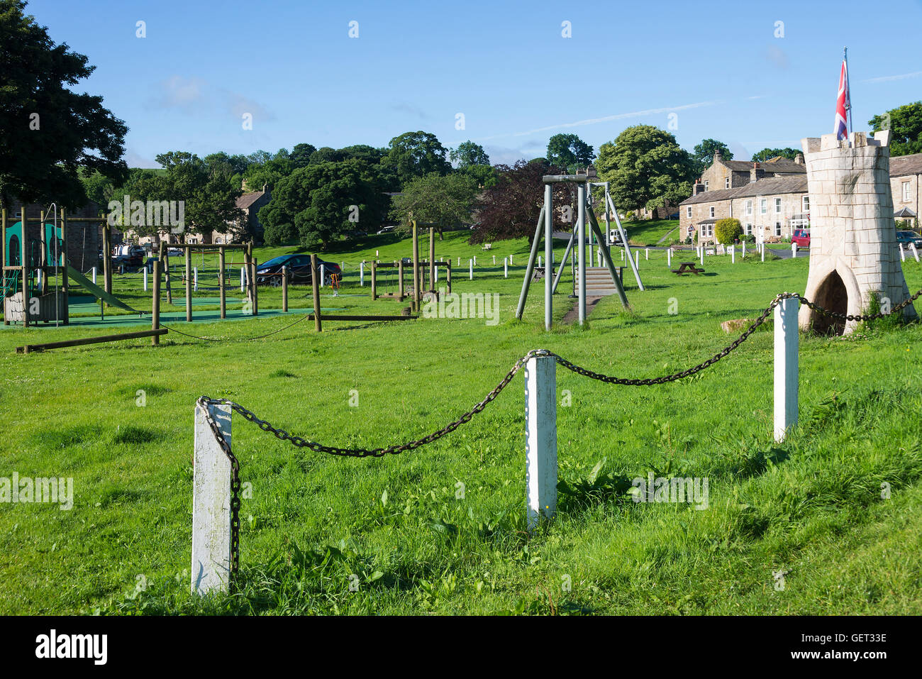 Childrens Playground on the Village Green in Bainbridge Yorkshire Dales National Park England United Kingdom UK Stock Photo