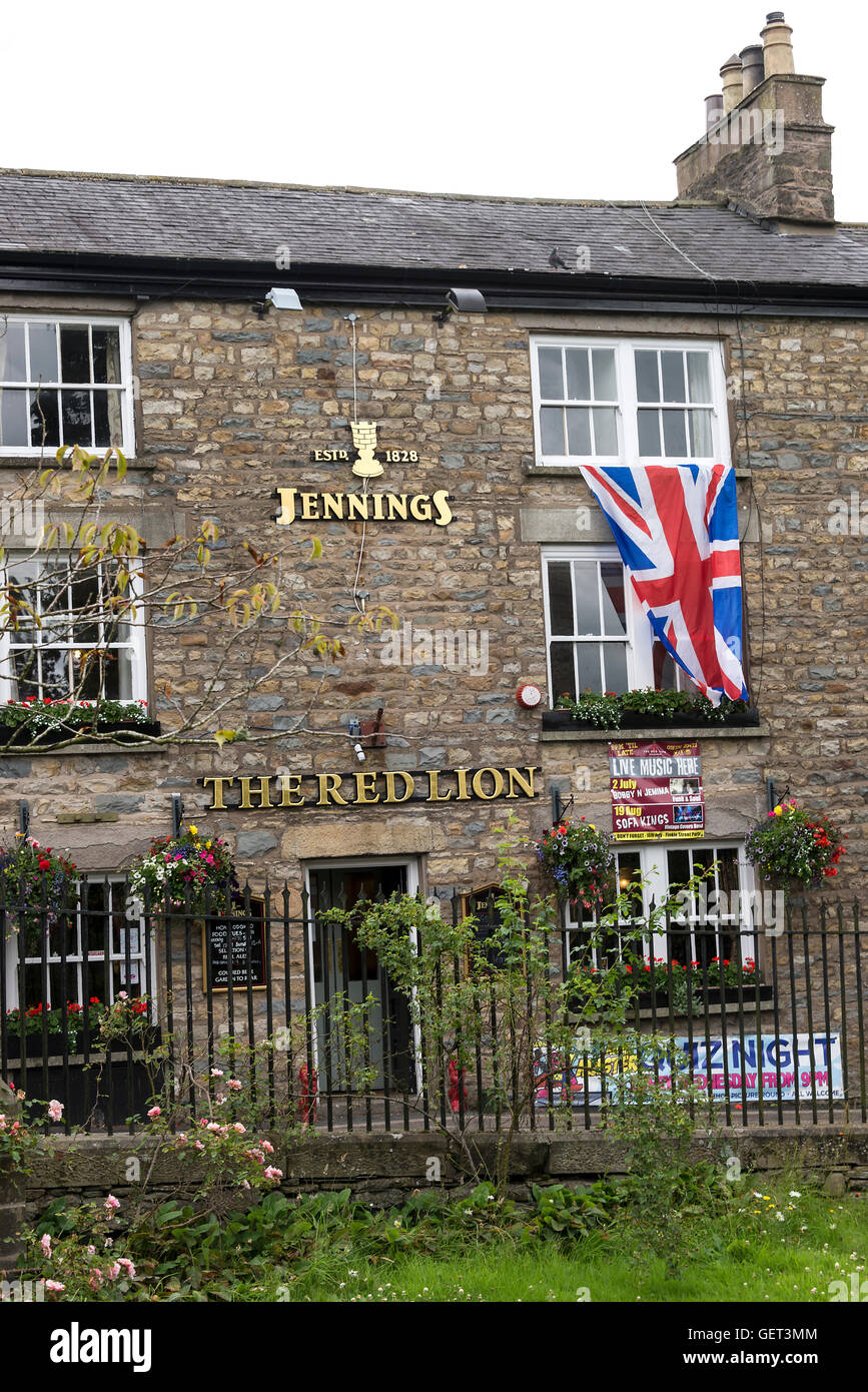 The Red Lion Public House with Union Jack Flag in Sedbergh Cumbria England United Kingdom UK Stock Photo