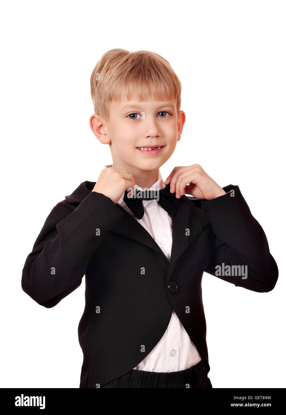 boy with bow tie and black tuxedo suit Stock Photo - Alamy