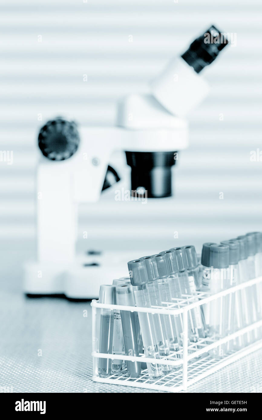 pipette and chemical glass in laboratory blue color Stock Photo Alamy