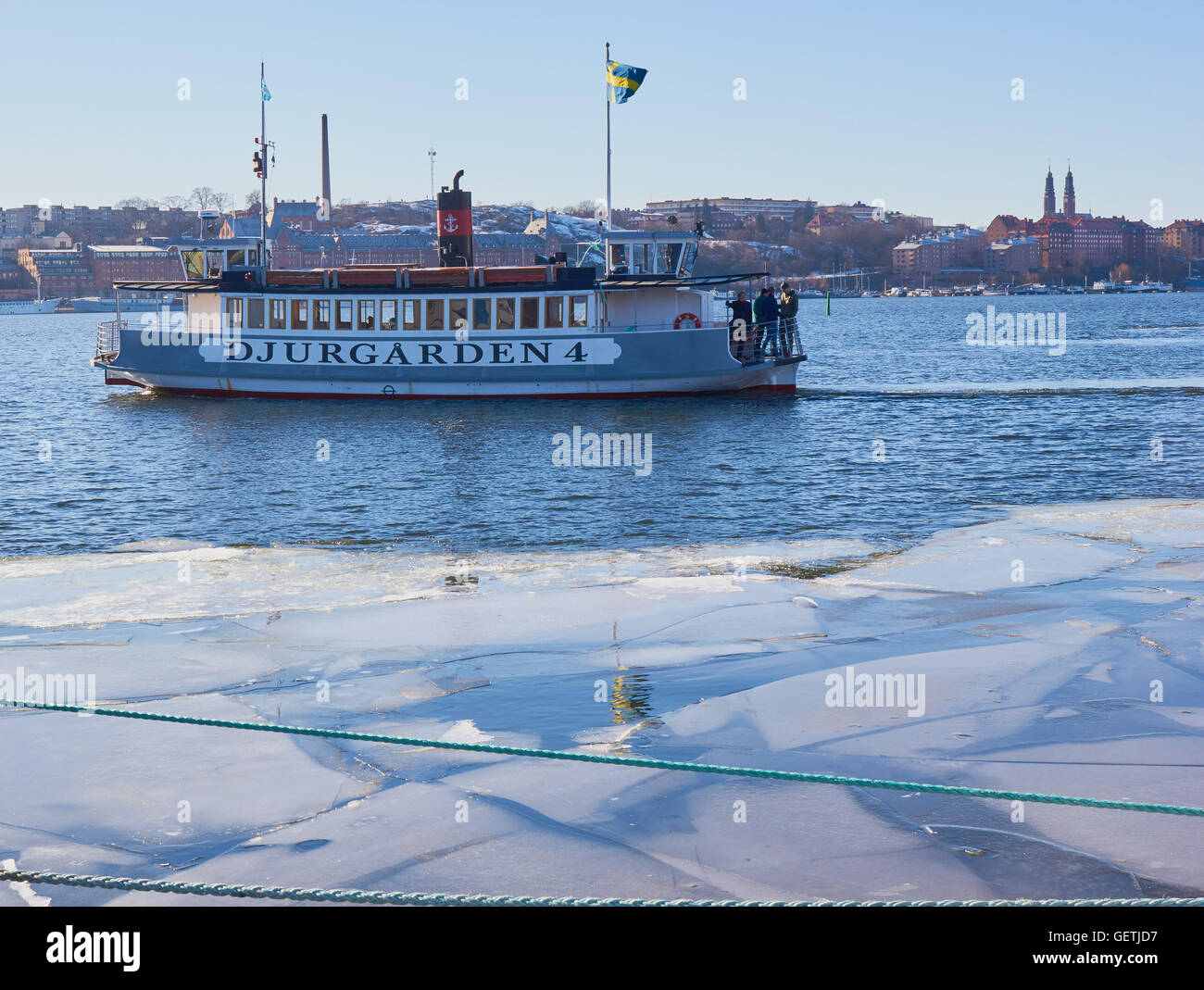 Winter scene with sheets of ice and Djurgarden ferry Stockholm Sweden Scandinavia Stock Photo